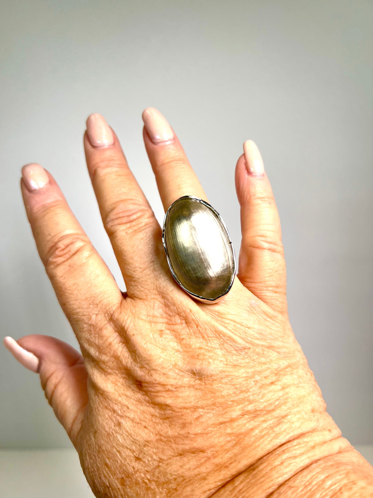 Alexis Bittar hand carved taupe Lucite Ring